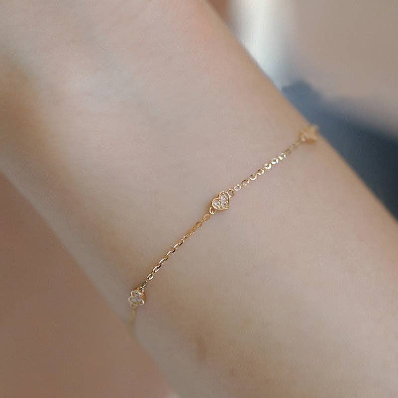 Dainty Gold Triple Heart Bracelet in 925 Sterling Silver