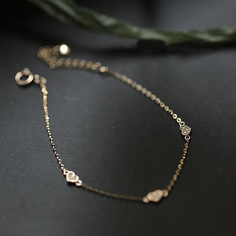 Dainty Gold Triple Heart Bracelet in 925 Sterling Silver