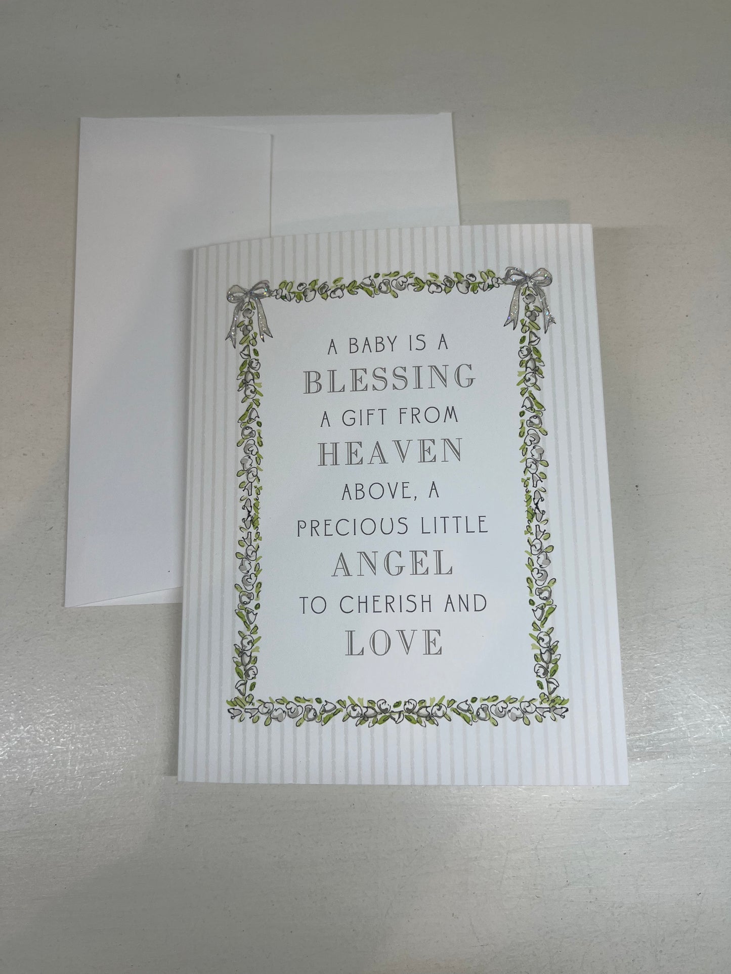 A Baby is a Blessing a Gift From Above… - White Floral Frame with Bows Card