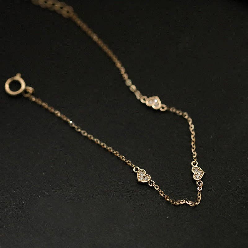 Dainty Gold Triple Heart Bracelet in 925 Sterling Silver